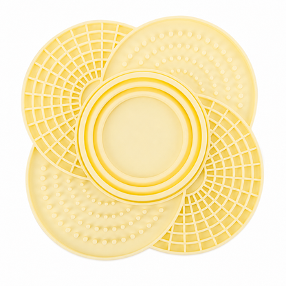 Yellow silicone slow feeder mat with collapsible bowl