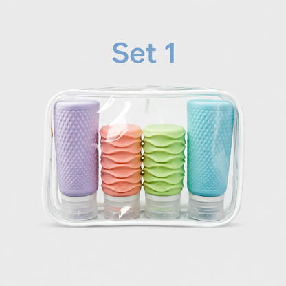 Set 1 four-piece silicone travel bottles in purple pink green and blue with clear bag