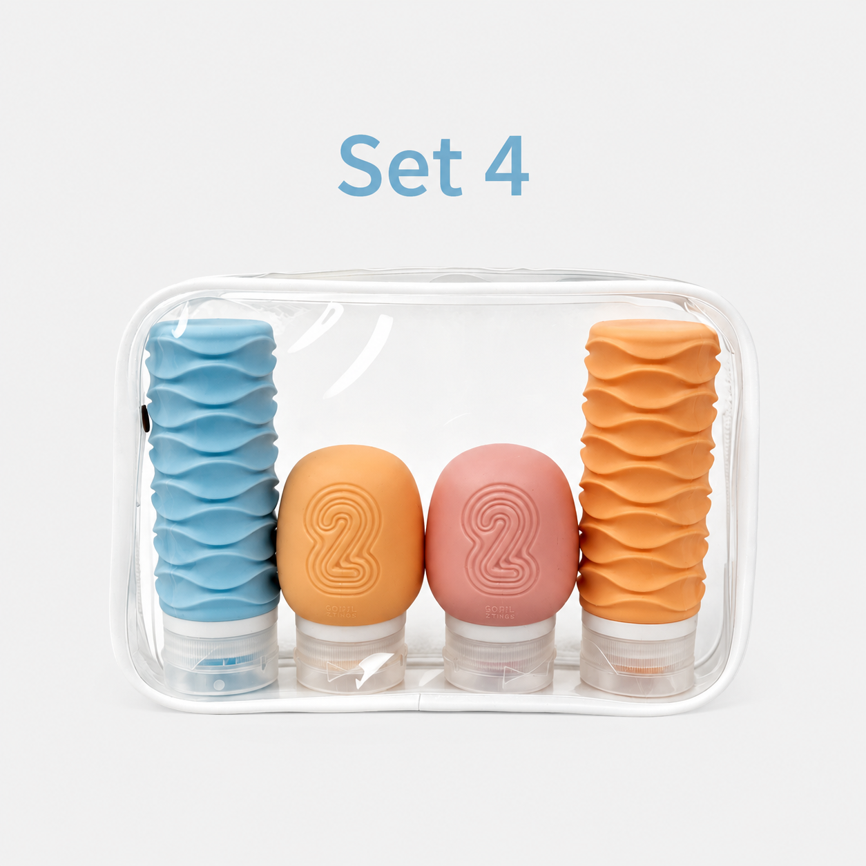 Set 4 four-piece silicone travel bottles in purple pink green and blue with clear bag