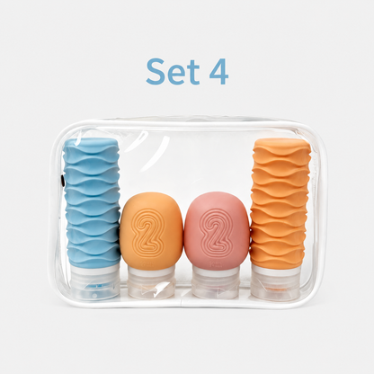 Set 4 four-piece silicone travel bottles in purple pink green and blue with clear bag