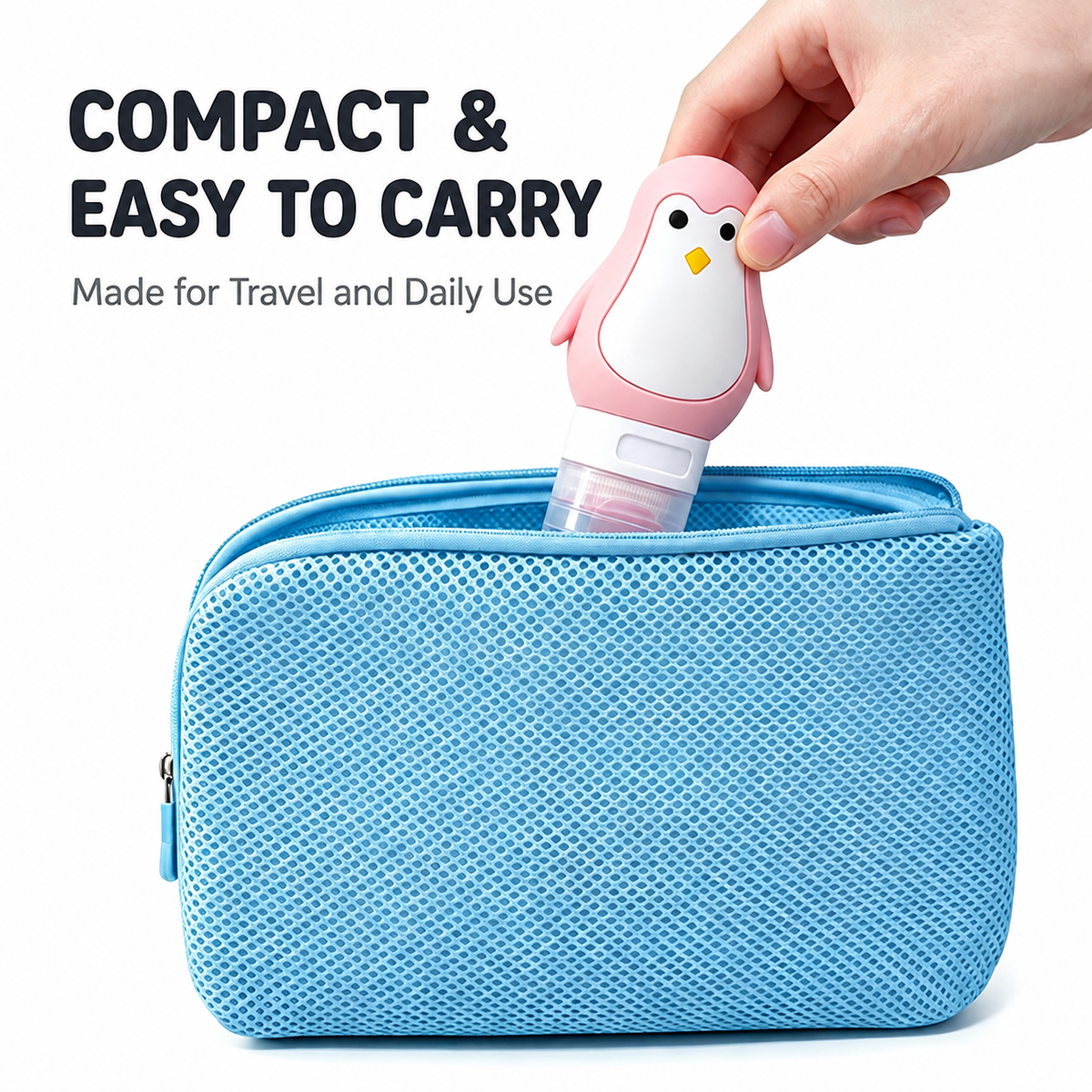 Pink penguin travel squeeze bottle placed inside a blue toiletry bag