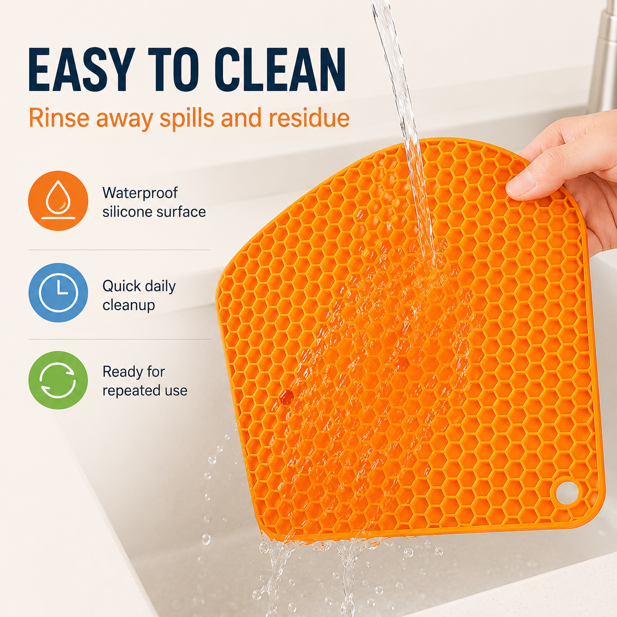 Orange honeycomb silicone placemat being rinsed under water, showing waterproof easy-clean surface for daily kitchen use.