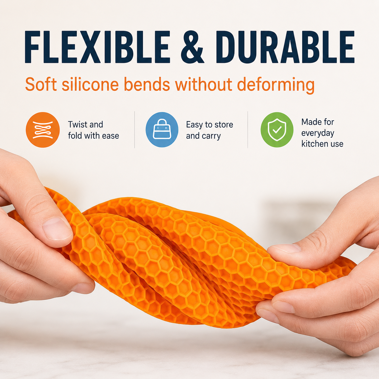 Orange honeycomb silicone placemat twisted by hand to show flexible and durable silicone material for everyday kitchen use.