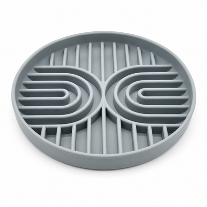 Gray silicone slow feeder dog bowl with raised maze design and suction base