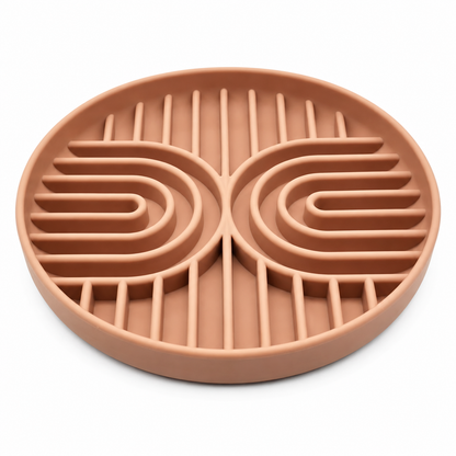 Brown silicone slow feeder dog bowl with raised maze design and suction base